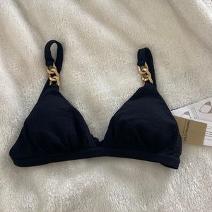 VIX by Paula Hermanny black triangle top bathing suit with gold finishing.